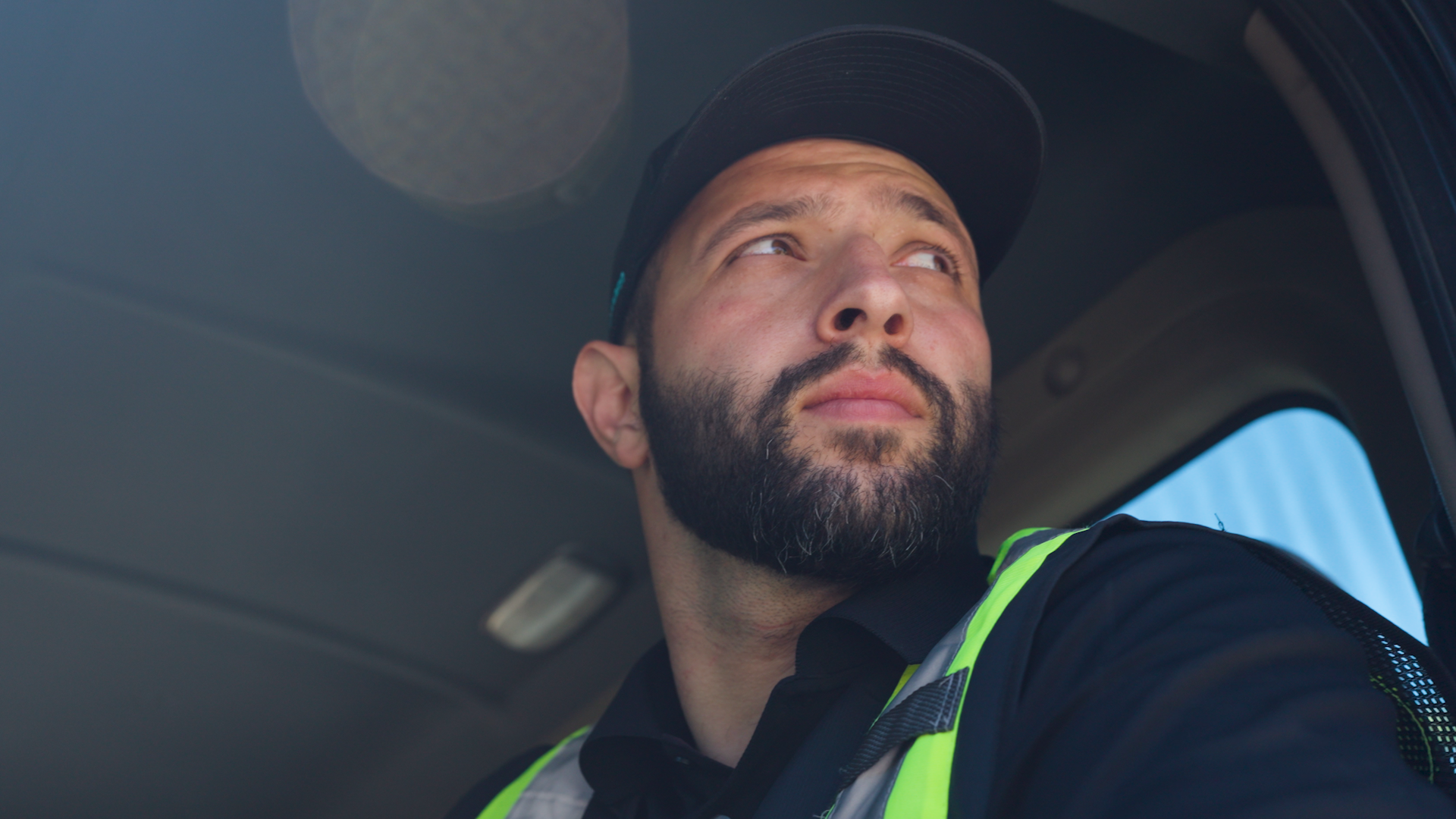 Man Watching out of Vehicle